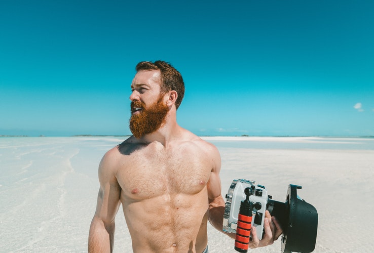 bearded man on the beach