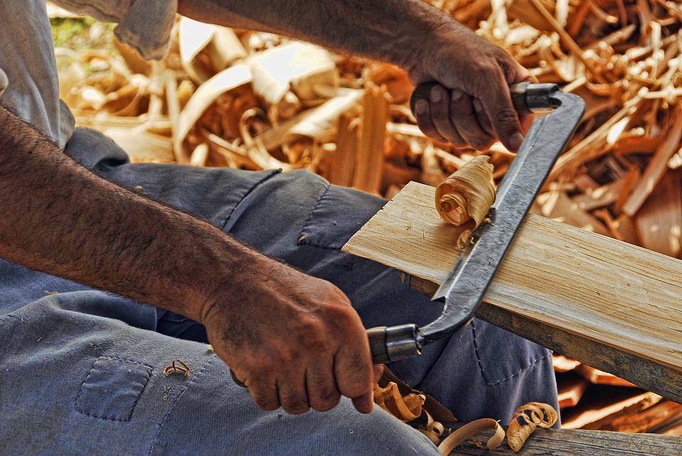 man doing wood work